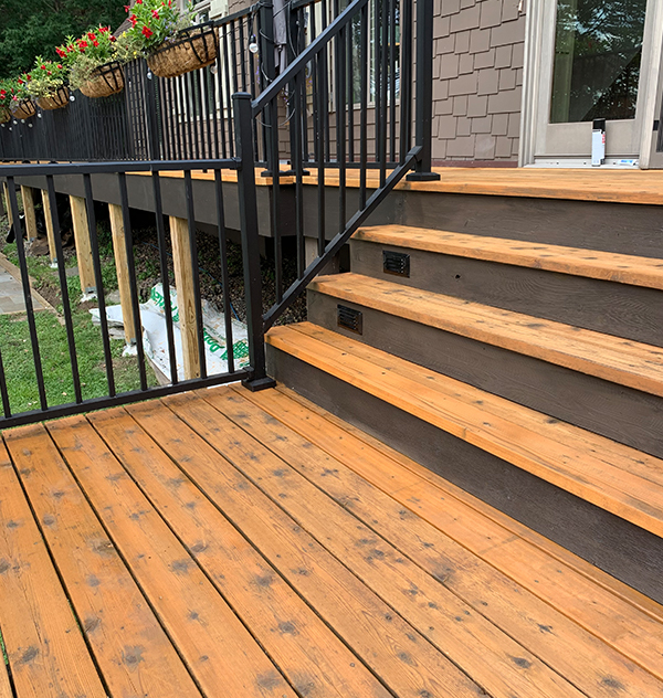Large deck stain job including fascia boards